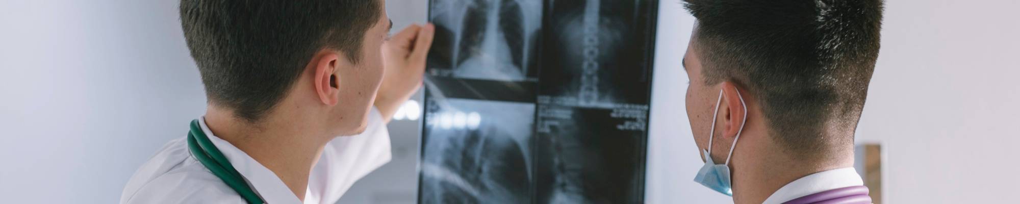 Doctors checking X-ray result