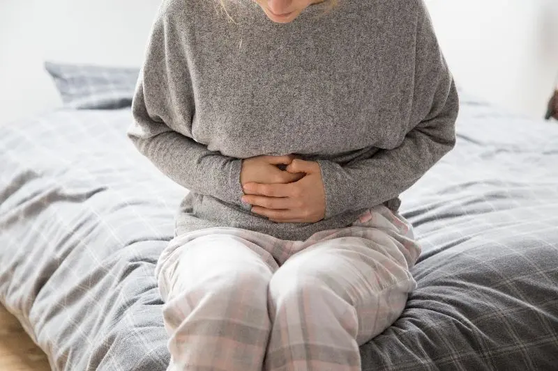 Woman having stomach pain